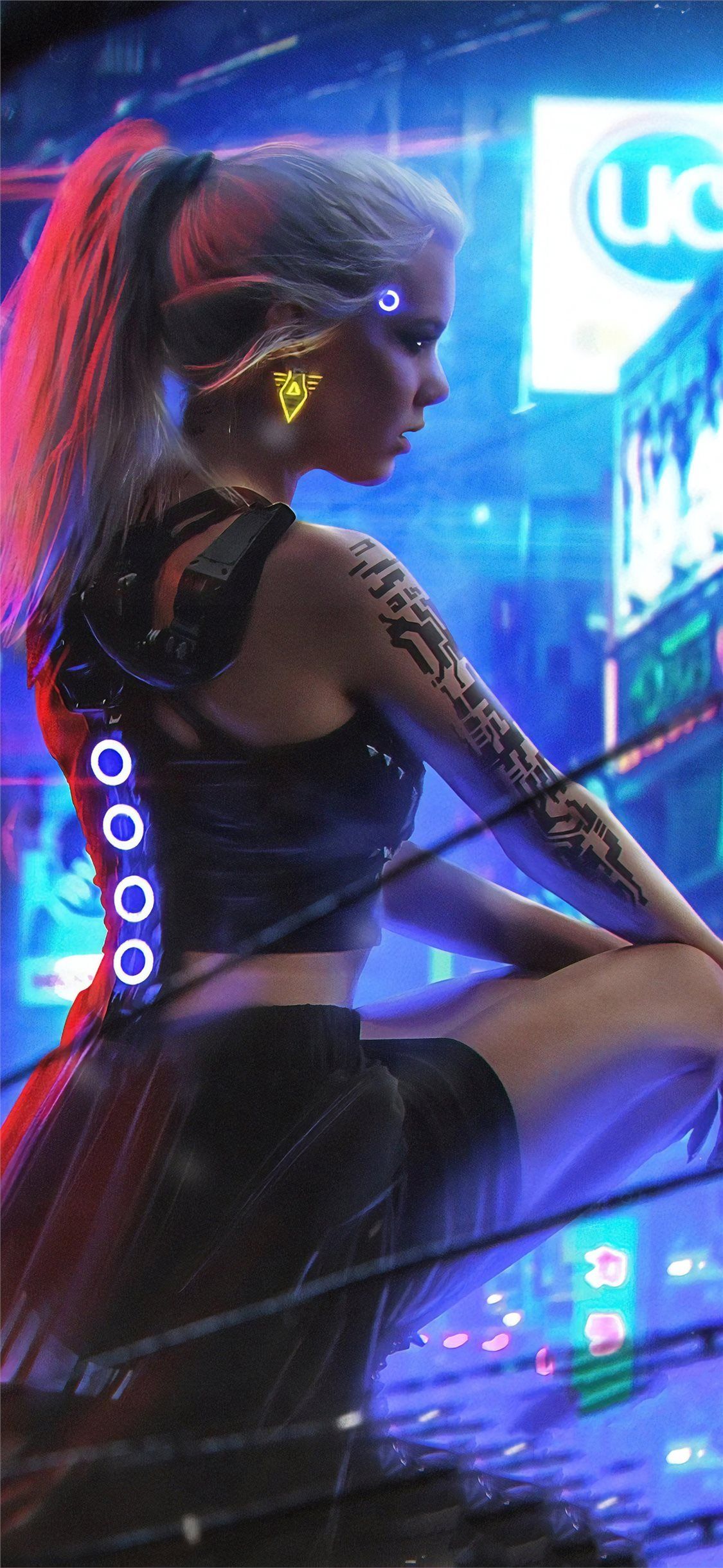 Cyberpunk girl with glowing skin and neon lights in the city - Cyberpunk