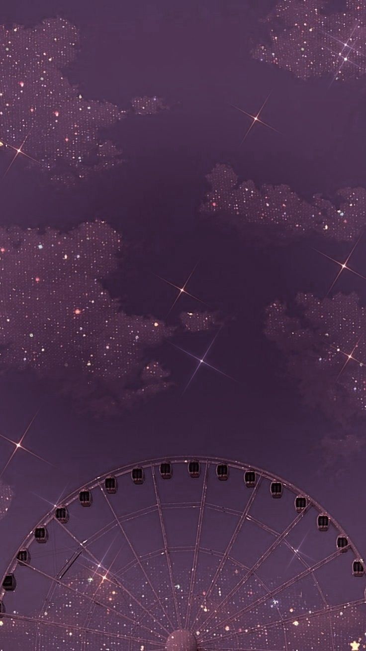 A ferris wheel is in the sky - Glitter