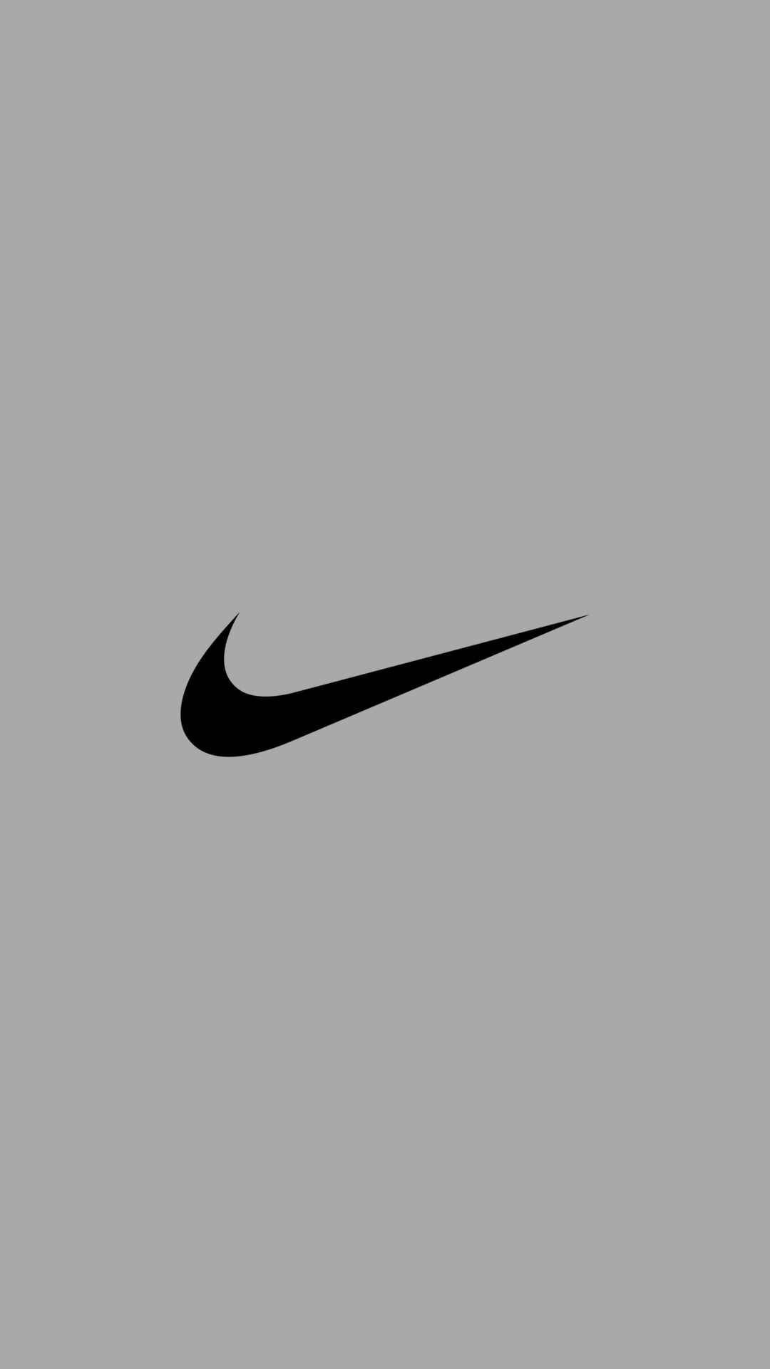 The nike logo on a grey background - Nike