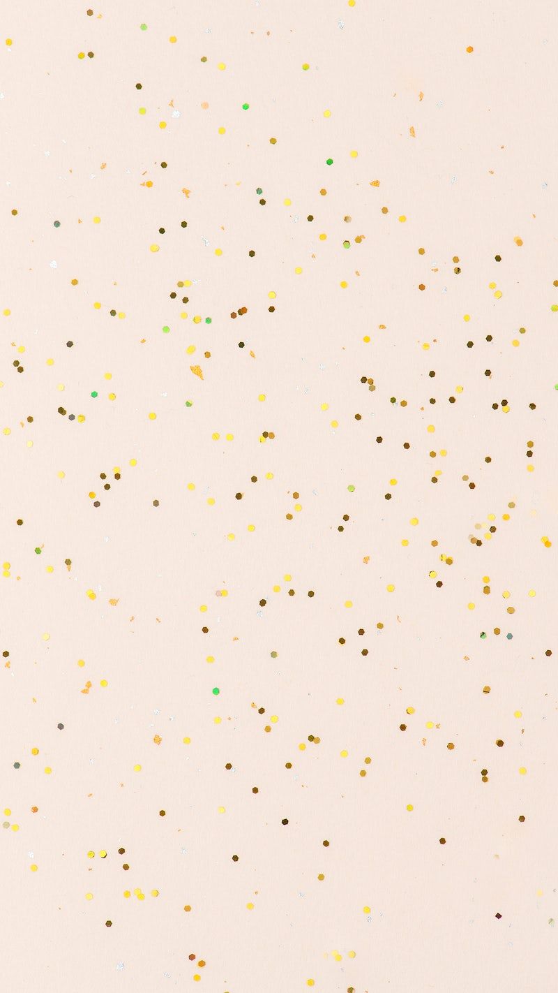 Gold confetti on a pink background - Glitter