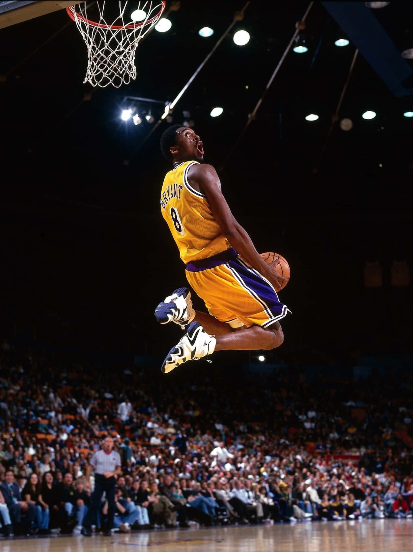 A man in the air jumping to dunk - NBA, basketball, Kobe Bryant