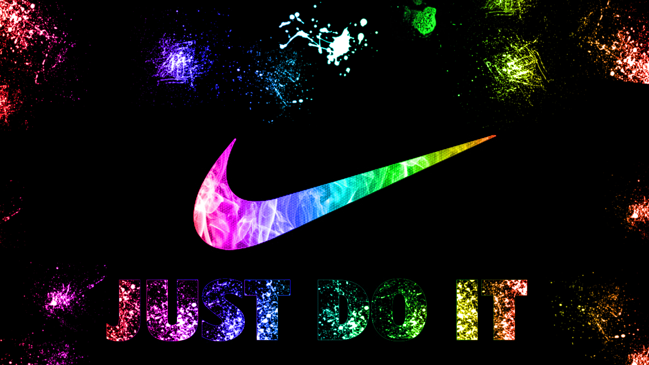 A nike logo with colorful paint splattered on it - Nike
