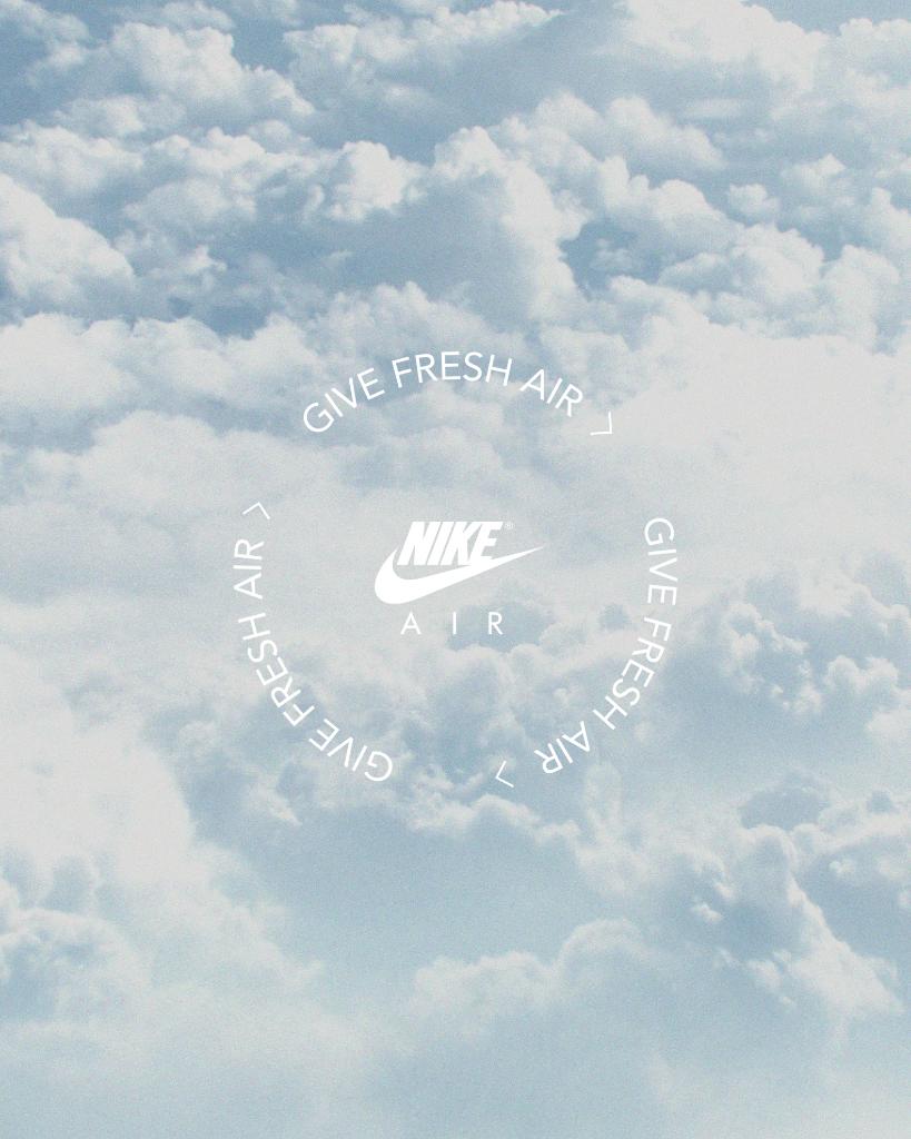 A cloudy sky with the nike logo - Nike