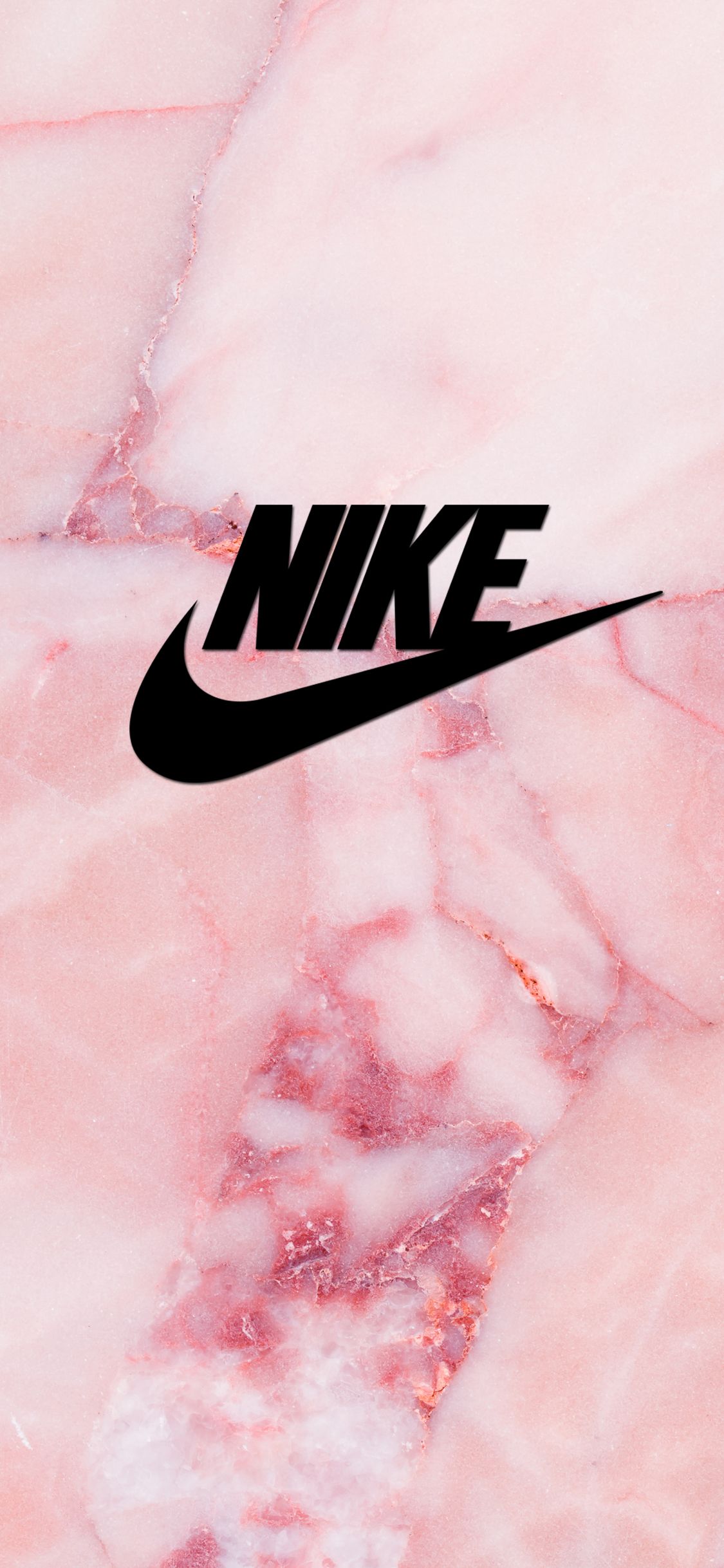 A close up of the nike logo on marble - Nike