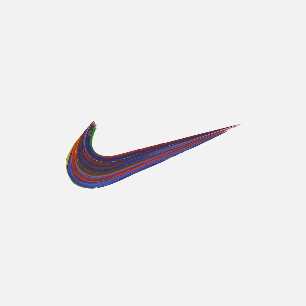 A nike logo with colorful stripes - Nike
