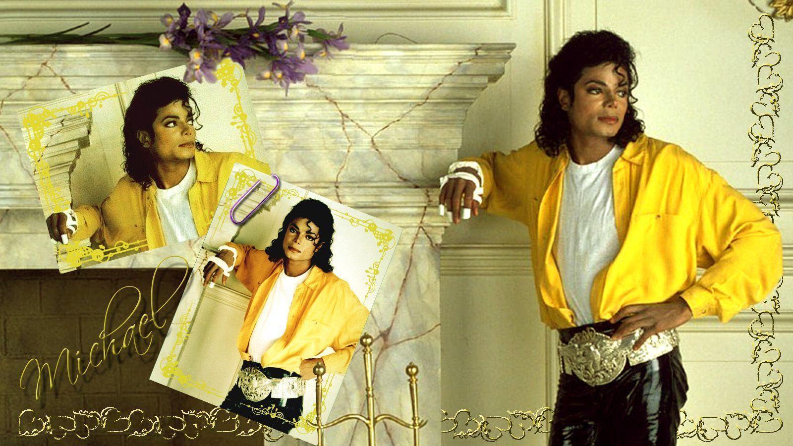 Michael Jackson posing with his album covers - Michael Jackson