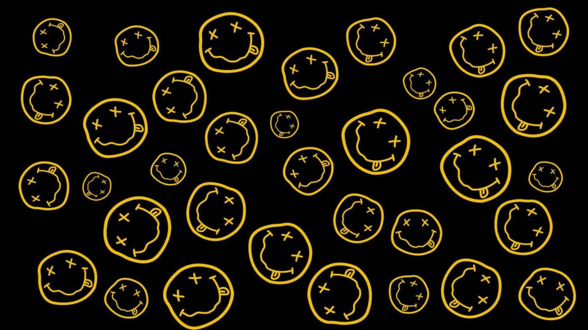 Download Nirvana Smiley Logo Wallpaper