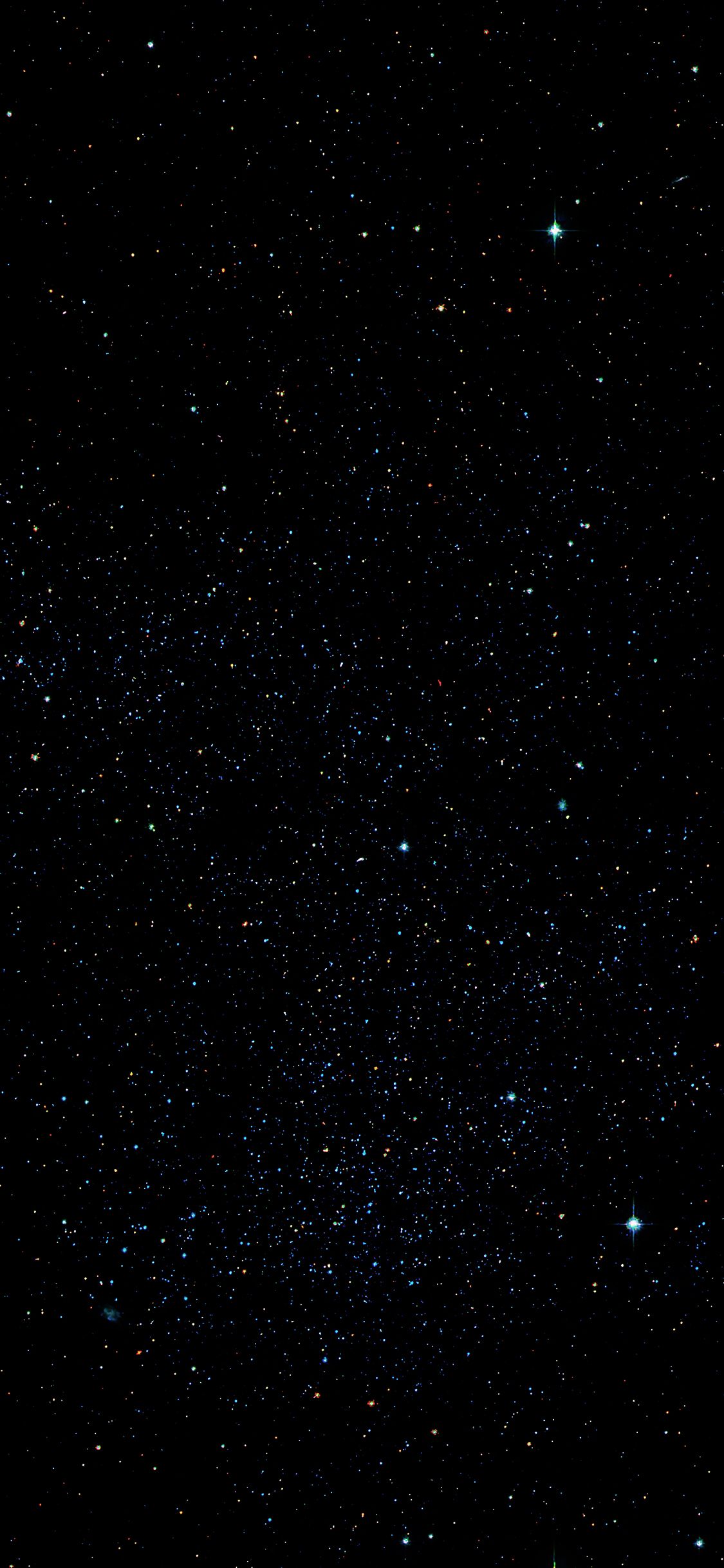 A starry night sky with a few stars visible - Gemini