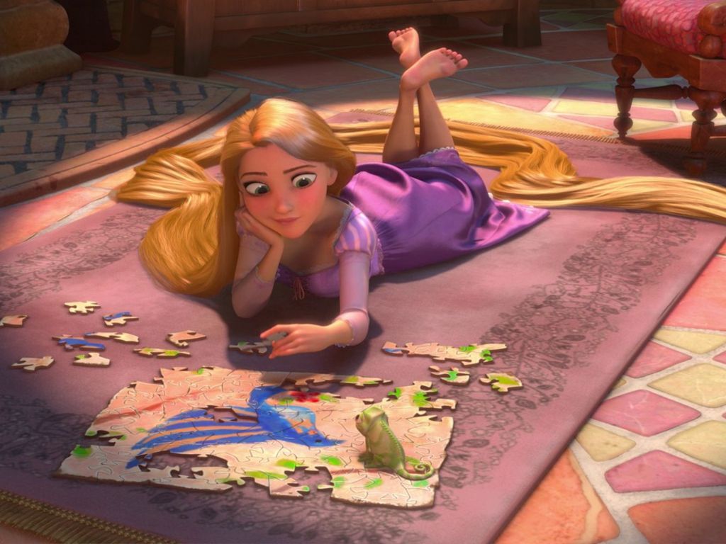 Rapunzel laying on the floor with puzzle pieces - Rapunzel