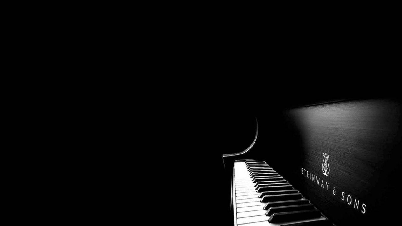 A black and white photo of a piano - Piano
