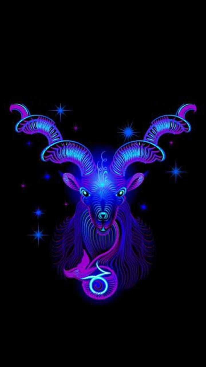 A purple and blue neon sign of a goat's head with stars around it - Capricorn, Aries