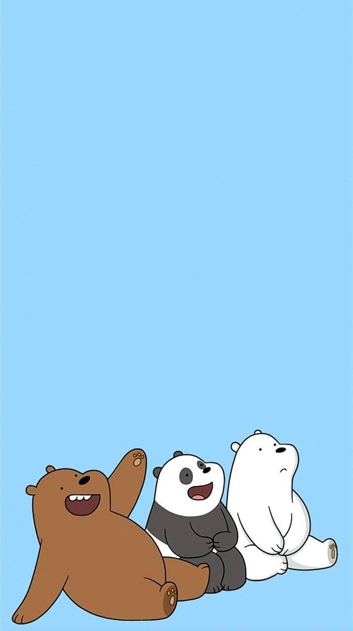 A cartoon bear and two other bears sitting on the ground - We Bare Bears