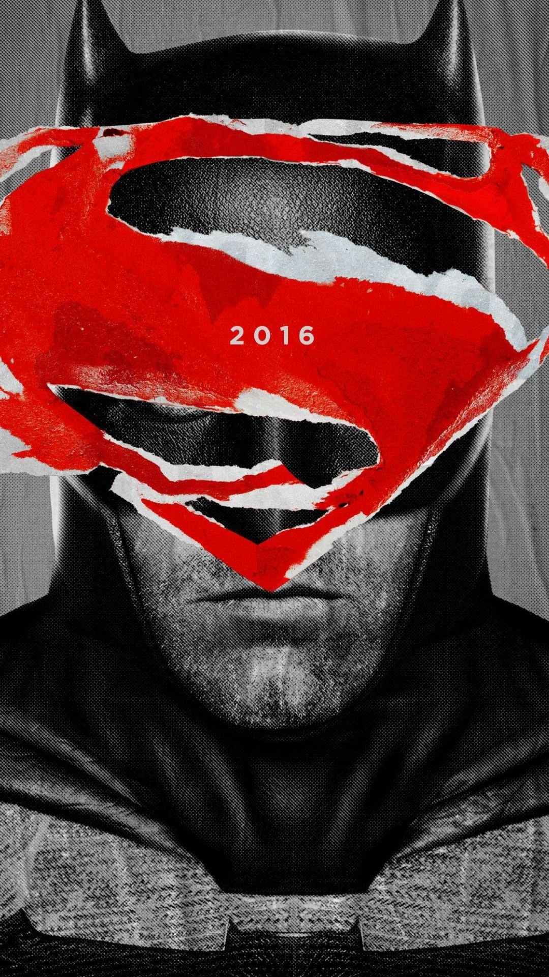 The Batman v Superman: Dawn of Justice logo is displayed on top of a black and white image of Ben Affleck as Batman. - Batman