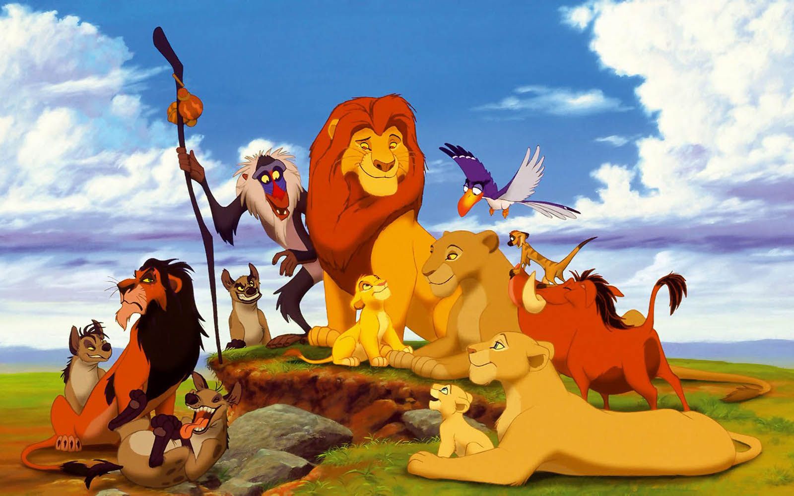 The lion king characters are standing on a hill - The Lion King