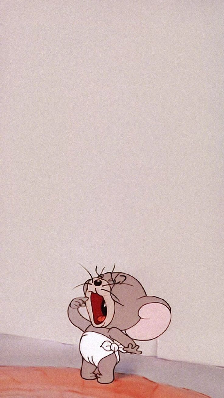 A cartoon character with its mouth open - Tom and Jerry
