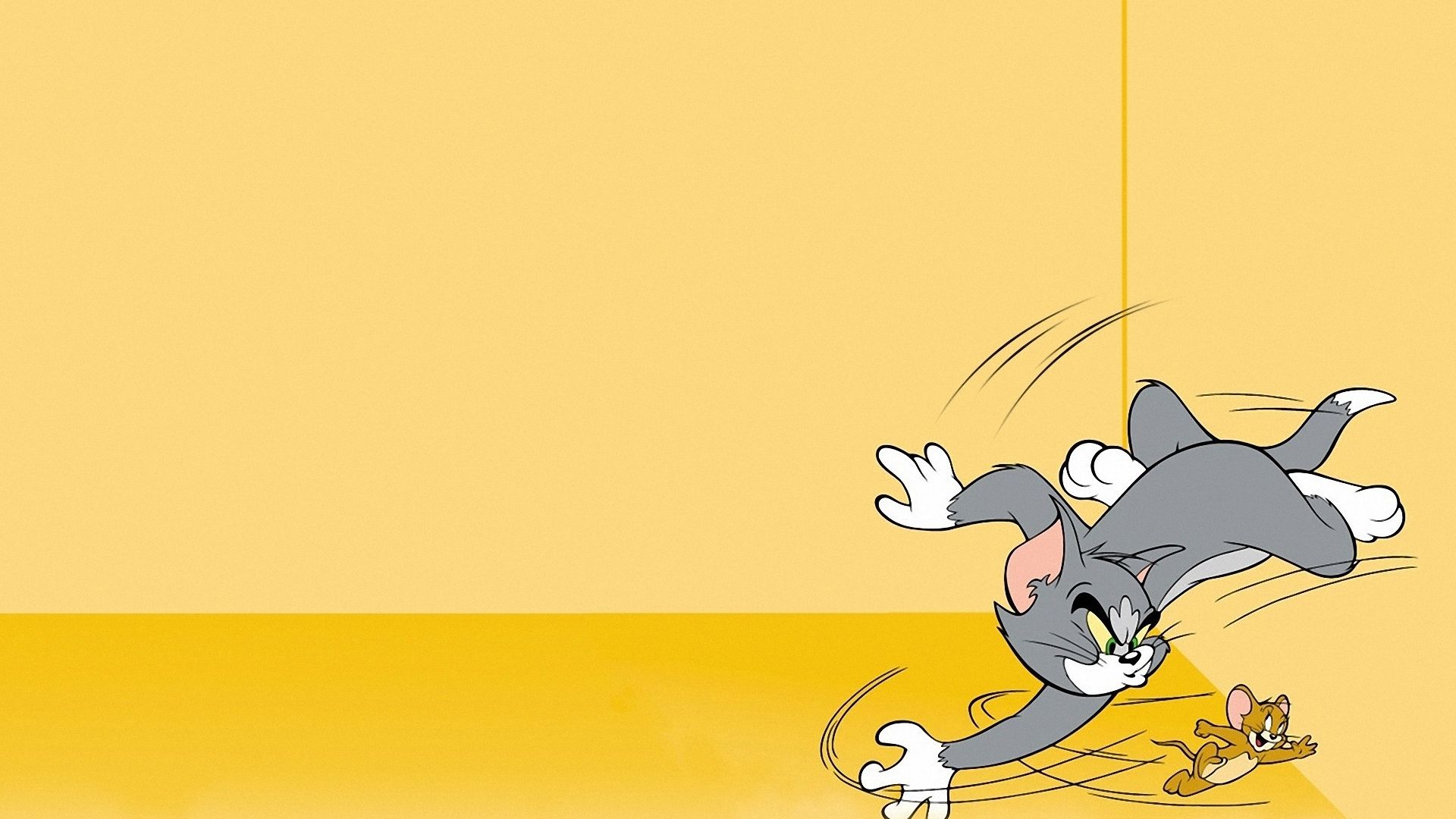 A cartoon cat is falling from the ceiling - Tom and Jerry
