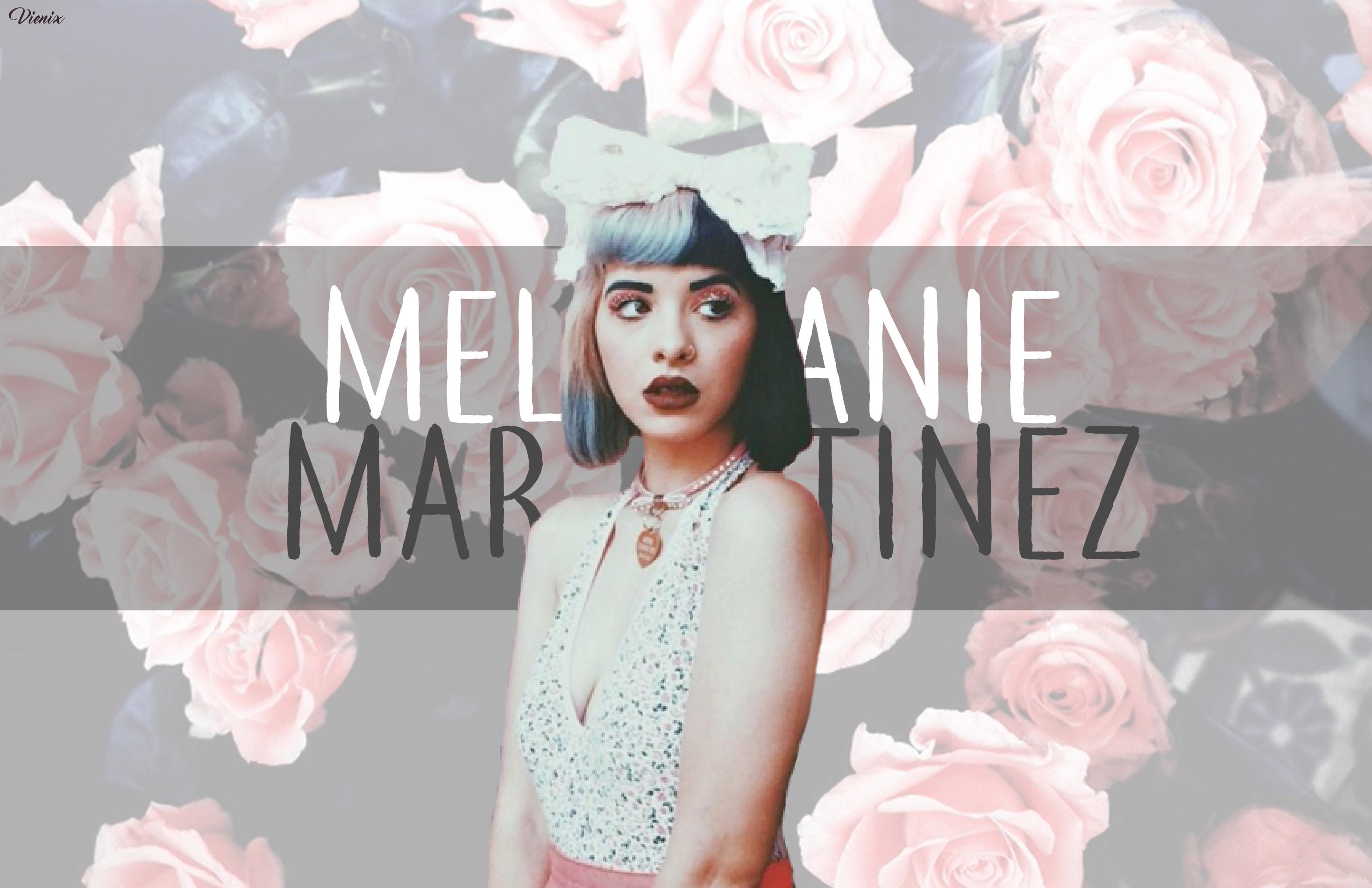 A woman with flowers in her hair - Melanie Martinez