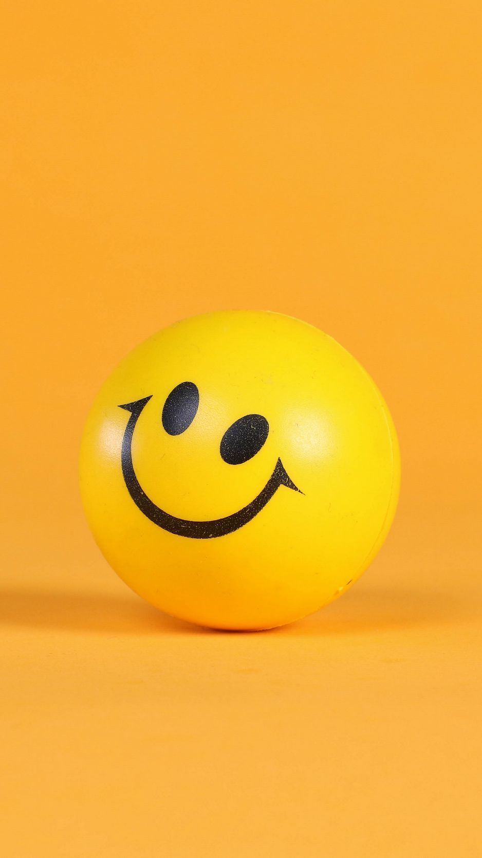 Yellow smiley ball on a yellow background - Smile, Smiley, yellow iphone
