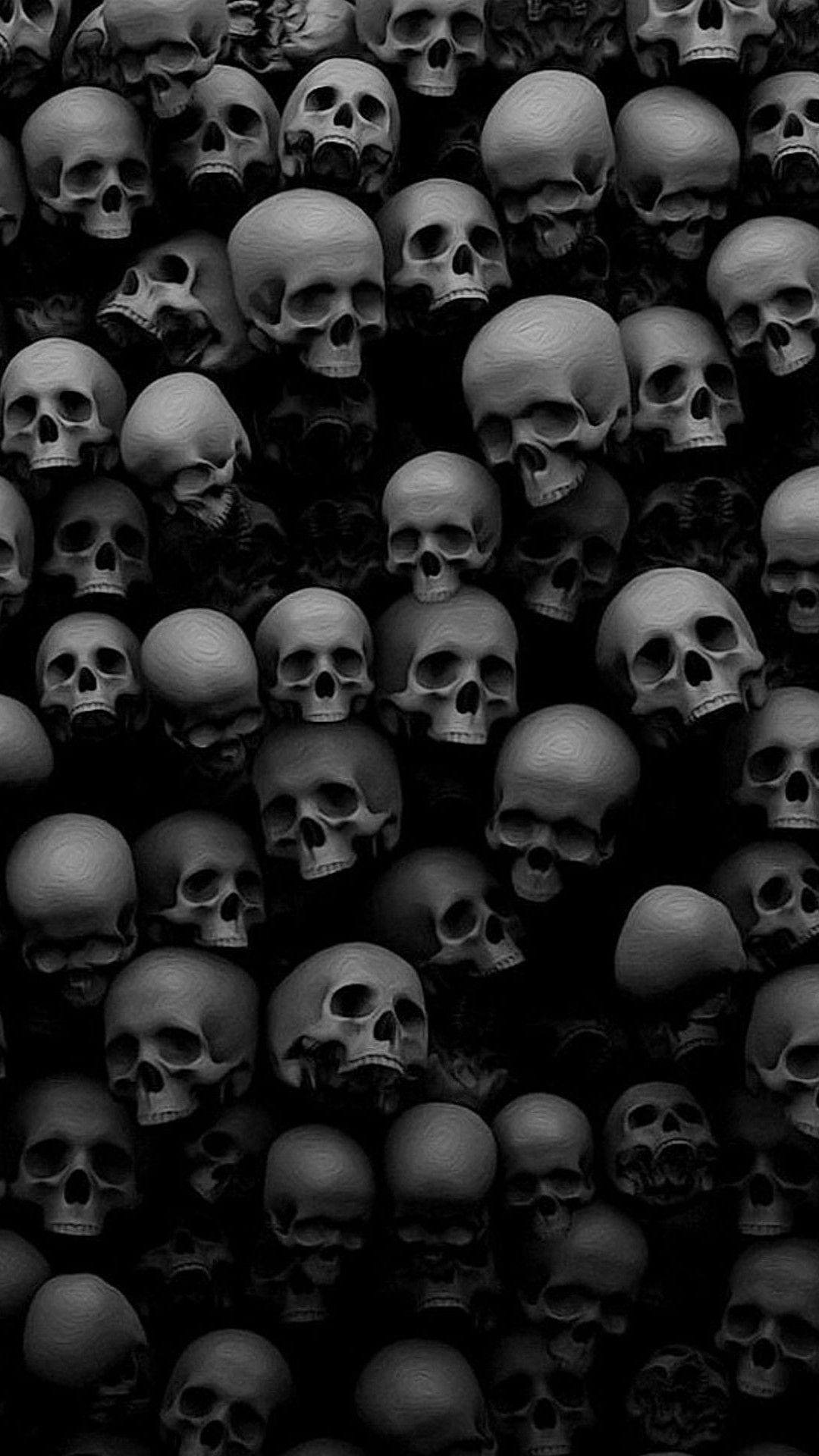 A wallpaper of many skulls in black and white. - Skull