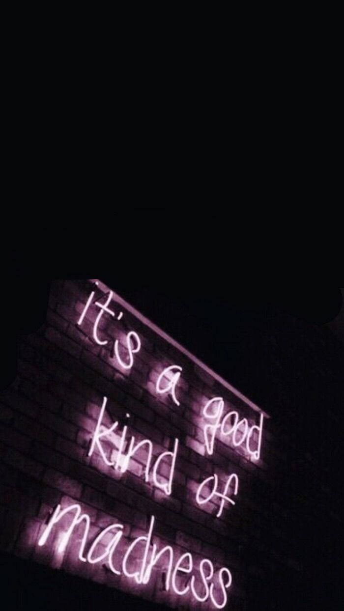 Neon sign that says it's a good kind of madness - Neon