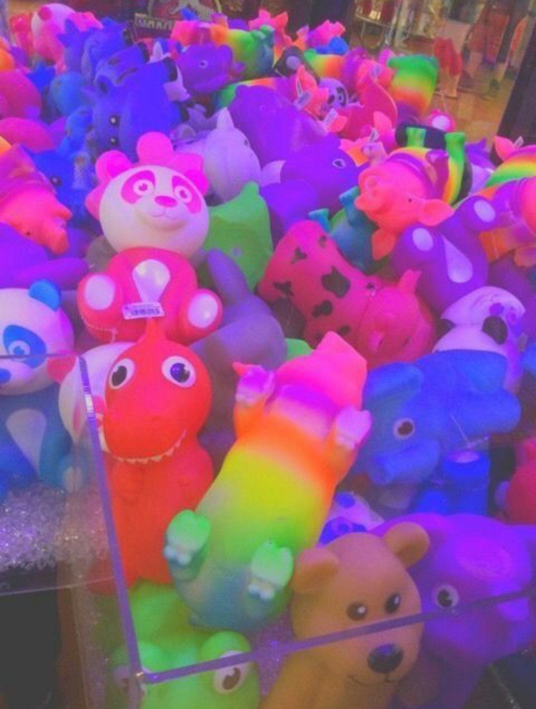 A bunch of stuffed animals in different colors - Kidcore