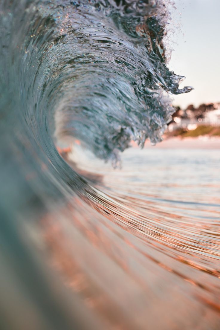 A wave is breaking on the beach - Wave