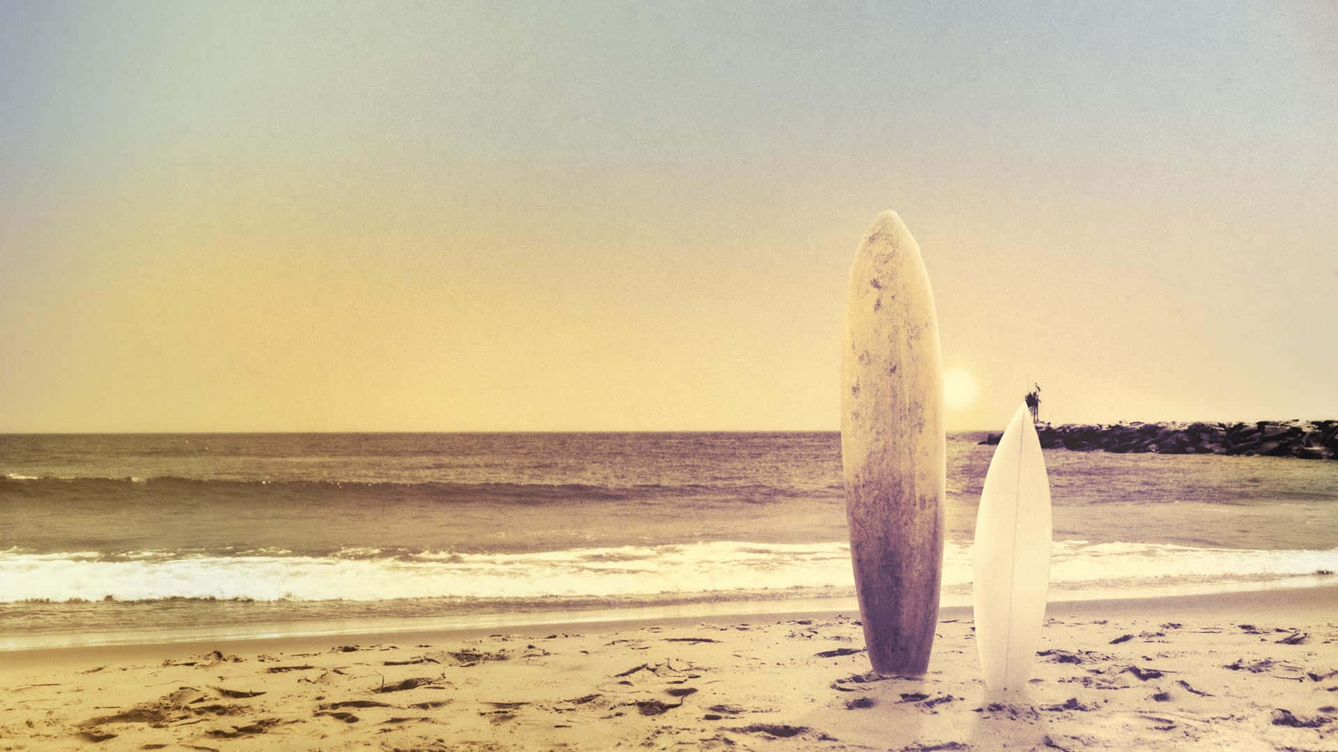 A couple of surfboards on the beach - Surf