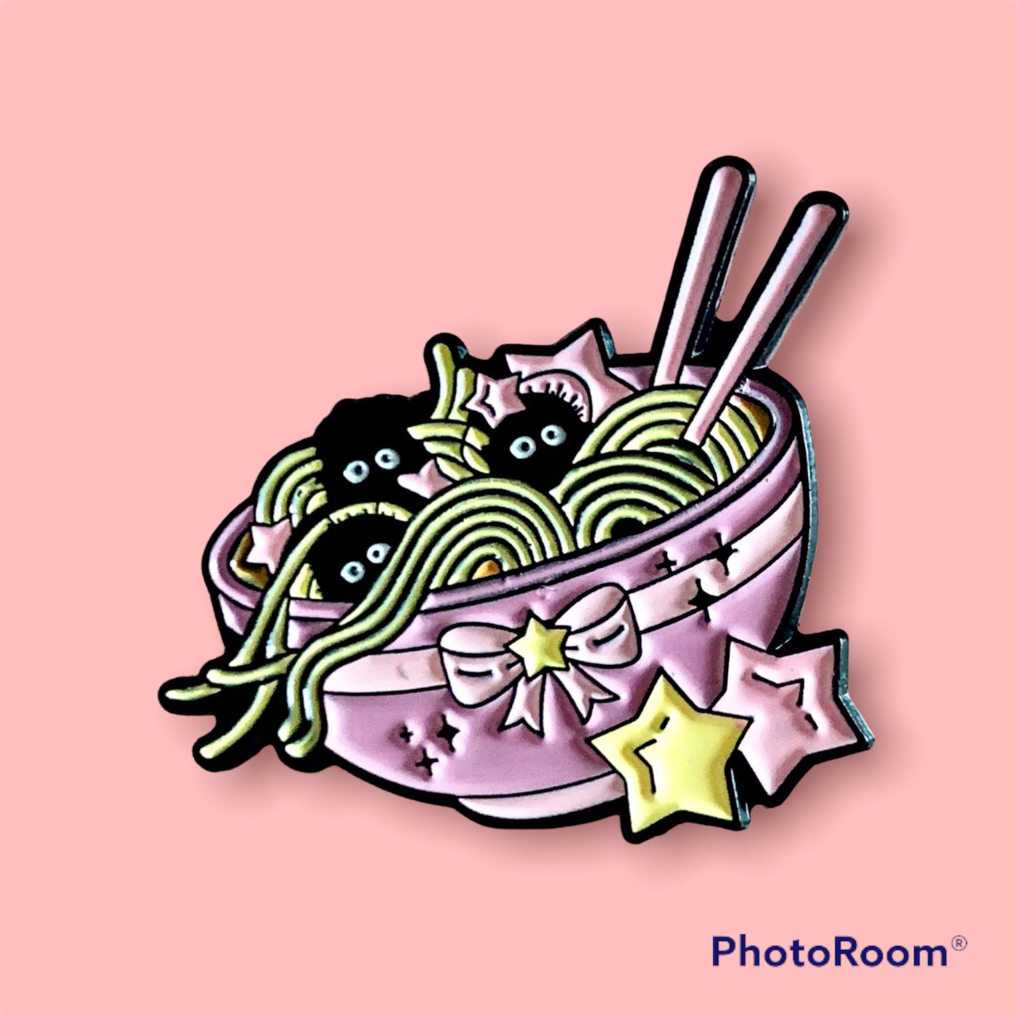 A bowl of noodles with stars and chopsticks - Ramen