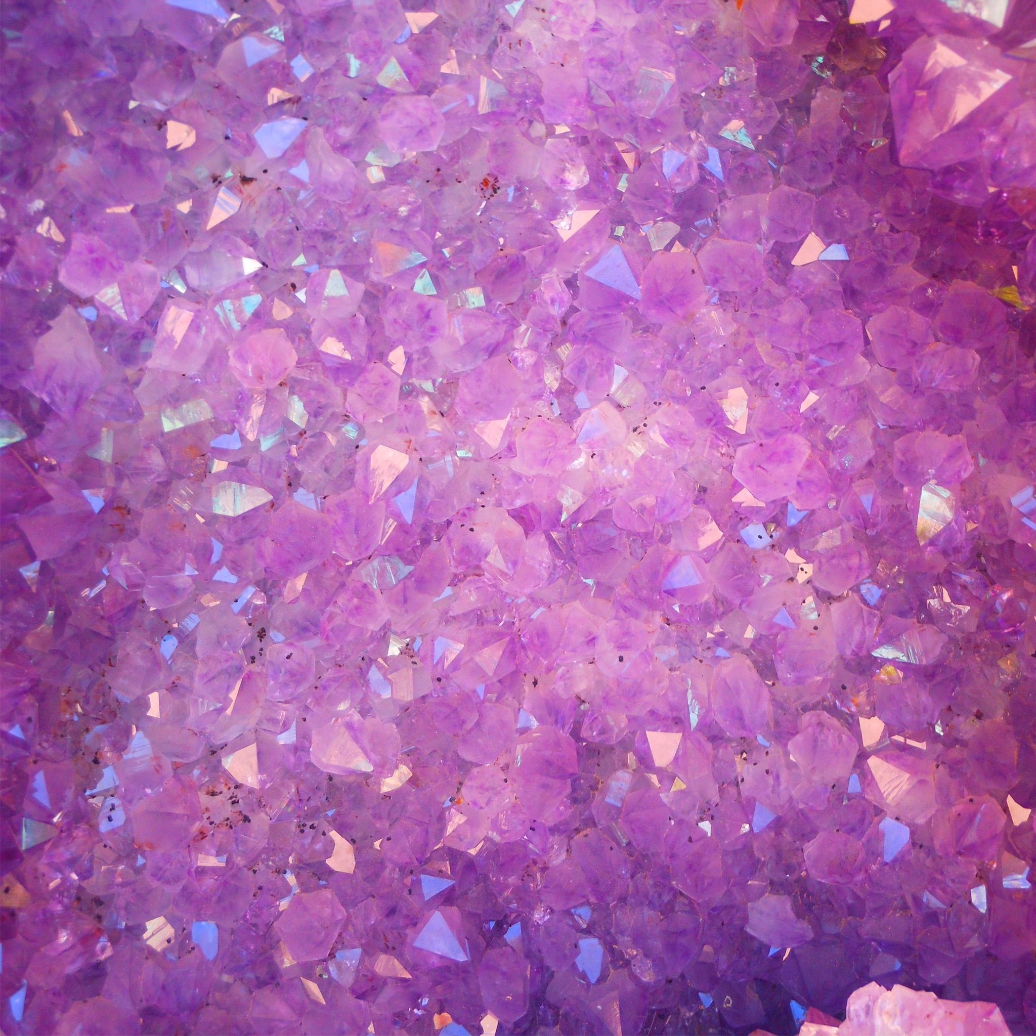 A close up of purple glitter on top - Diamond