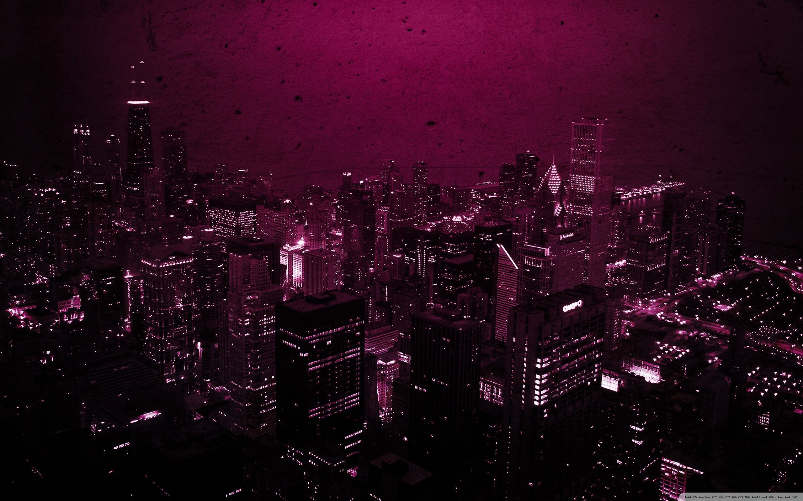 A city skyline with pink lighting - Magenta