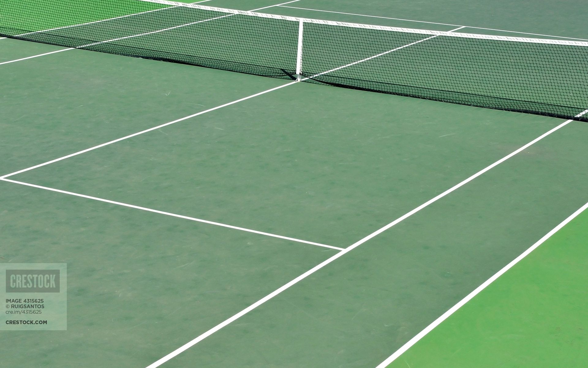 A tennis player is standing on the court - Tennis