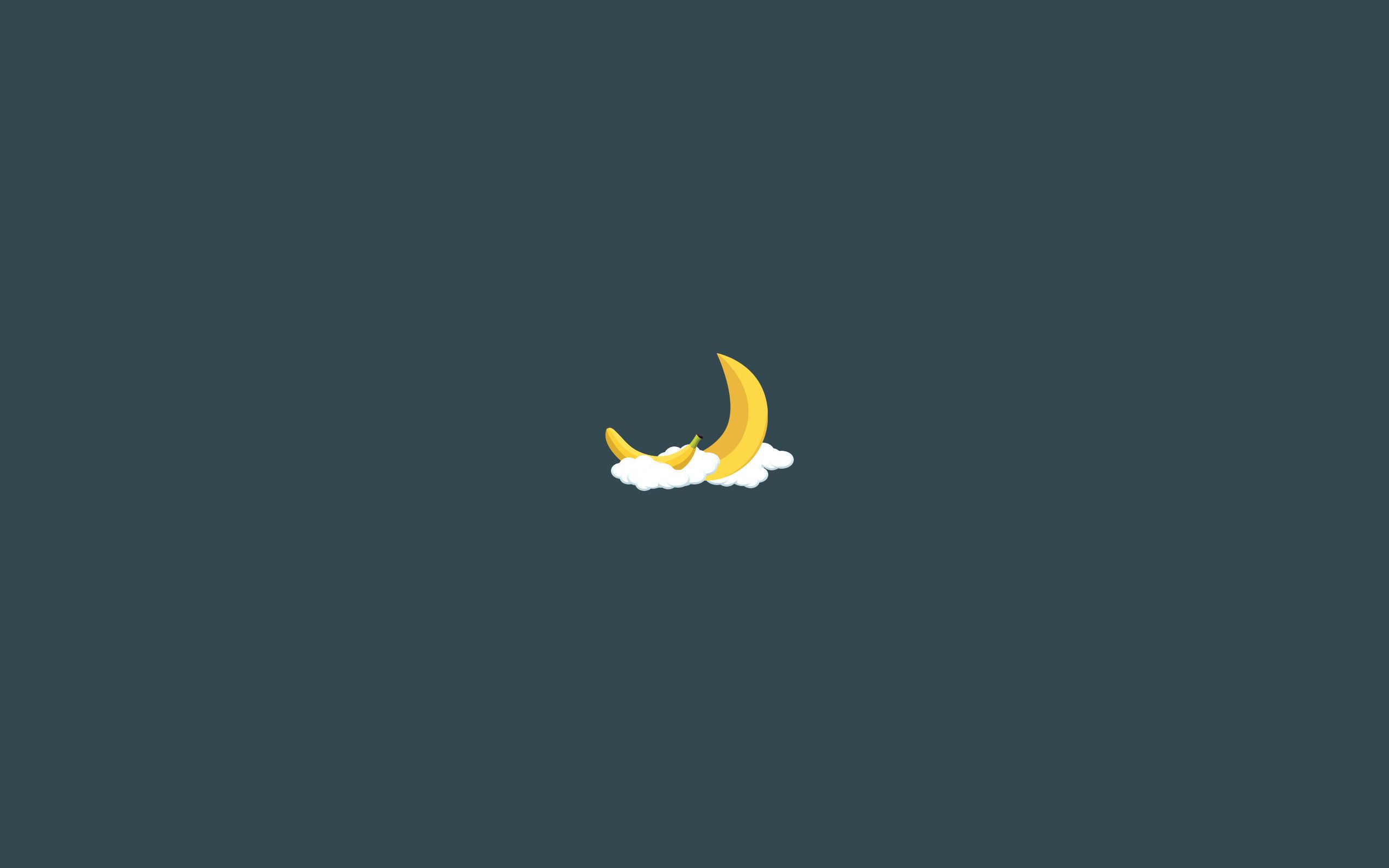 A yellow crescent moon sits on a white cloud on a dark blue background. - Banana