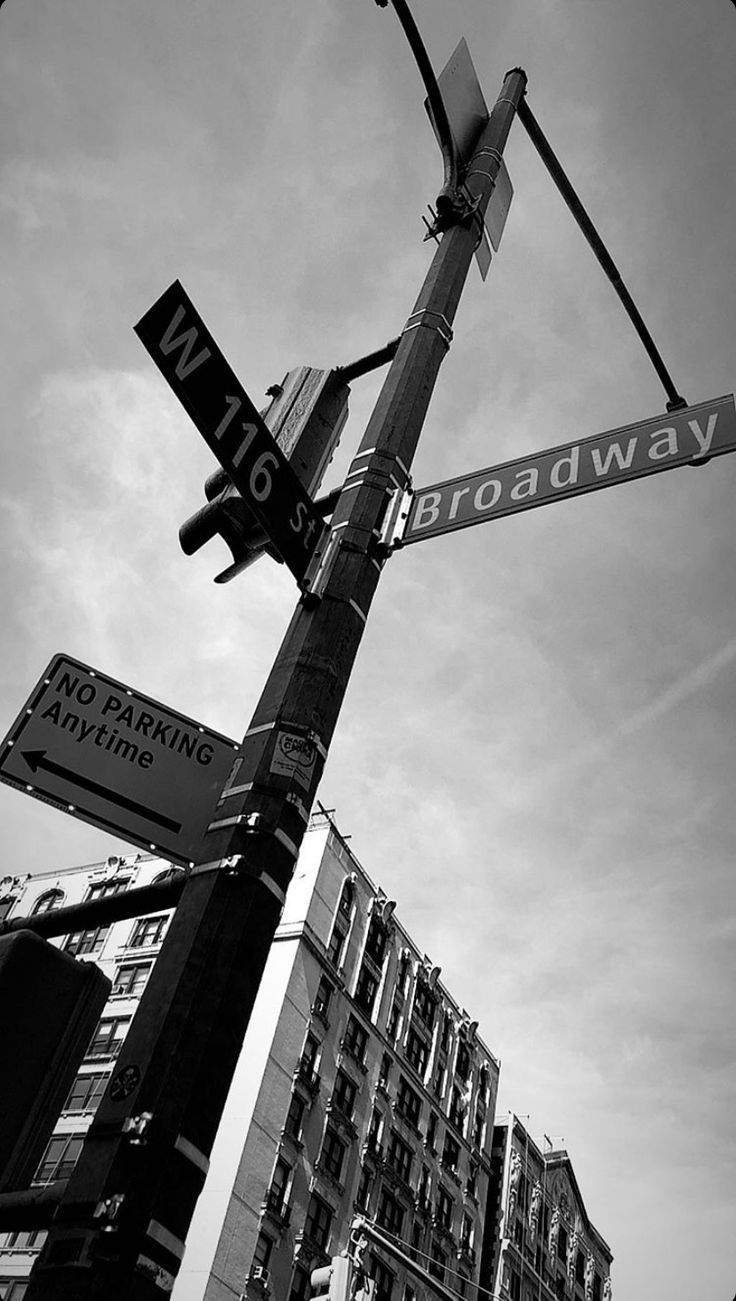 A street sign is on the pole - Broadway