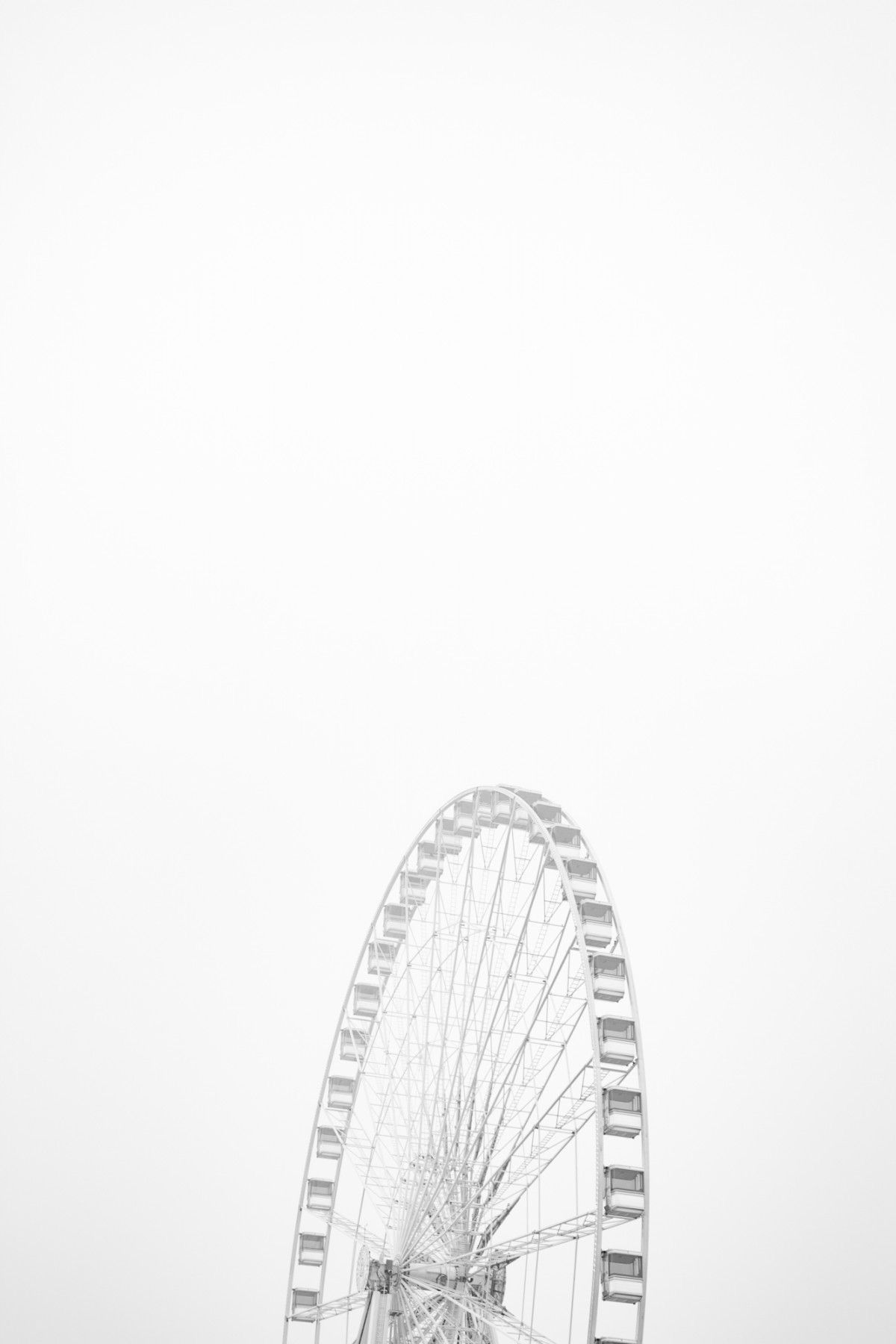 A ferris wheel is in the sky - Cute white, white