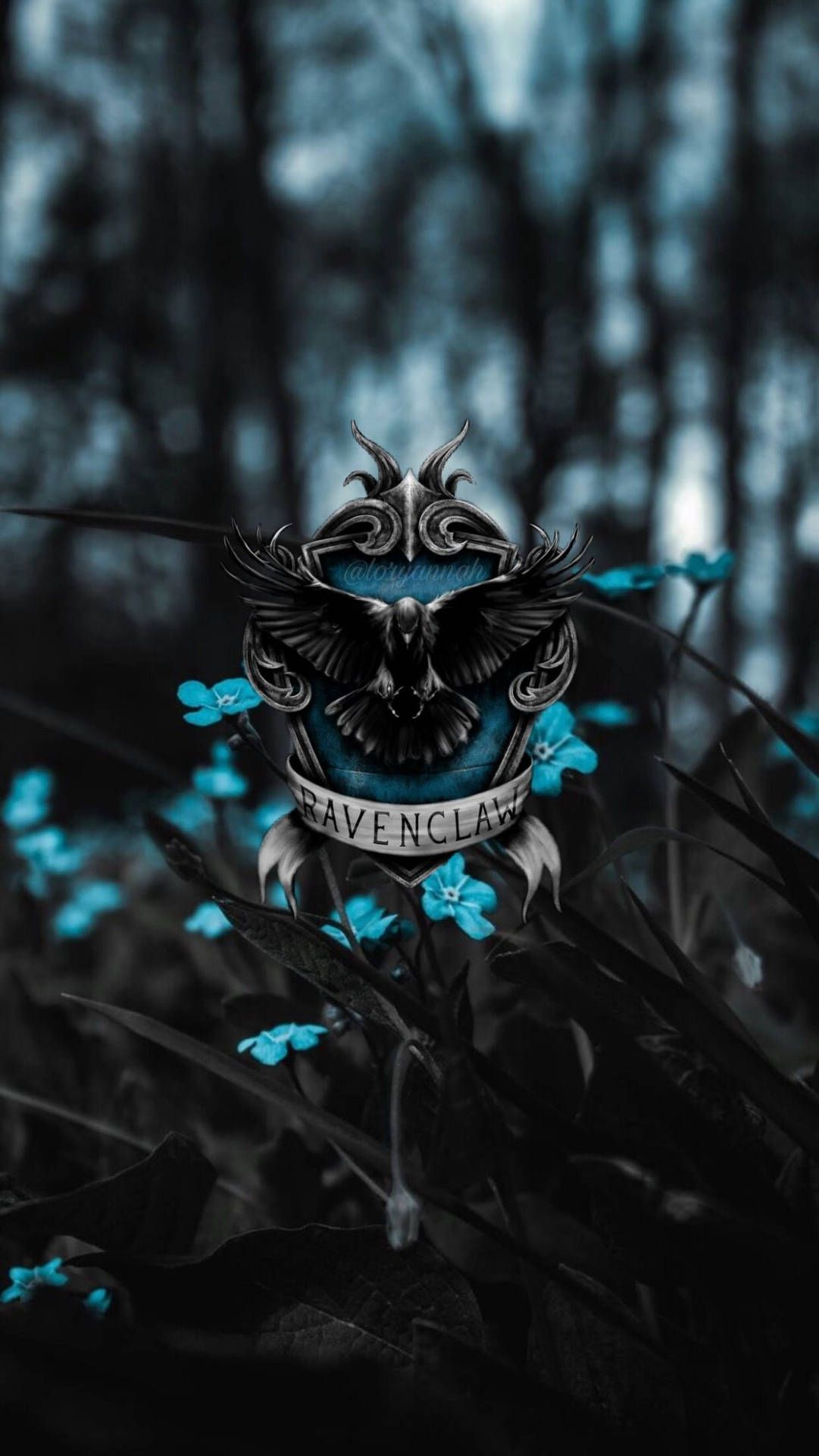 A black bird on top of some blue flowers - Ravenclaw