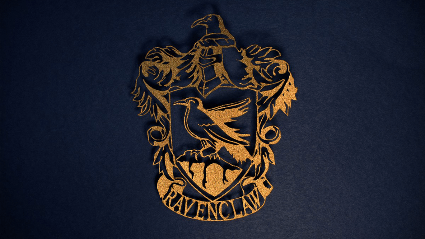 A gold and brown emblem with an eagle on it - Ravenclaw