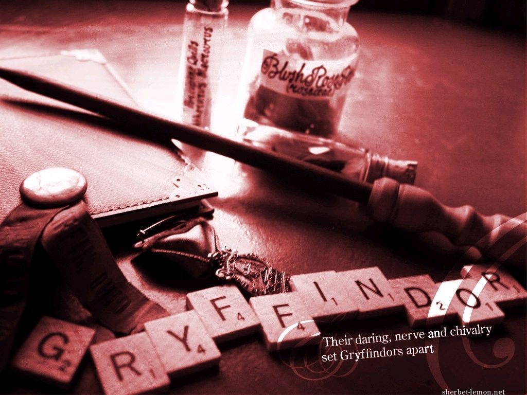 A close up of some letters on the table - Gryffindor