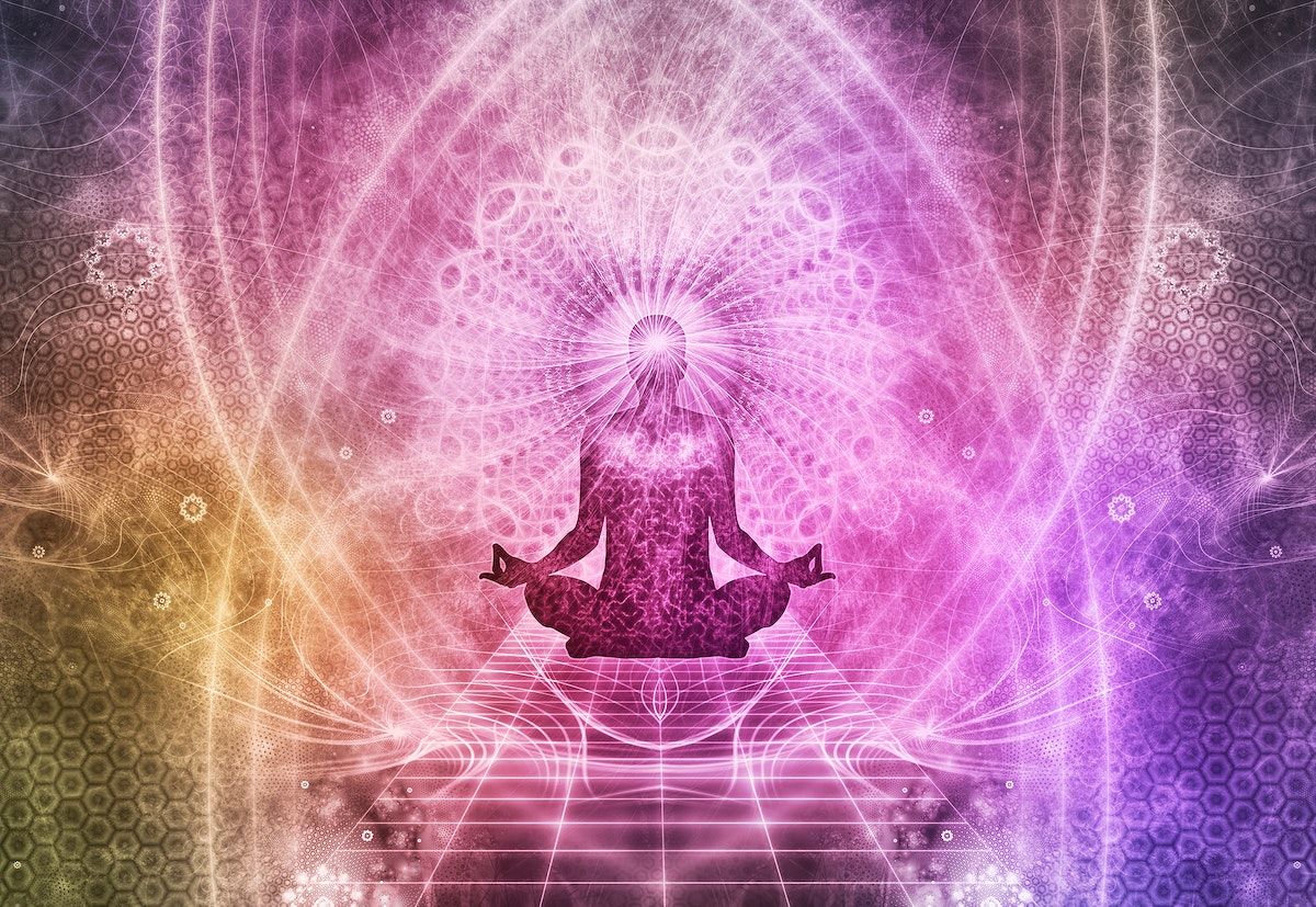 A person meditating with a pink and purple background - Spiritual