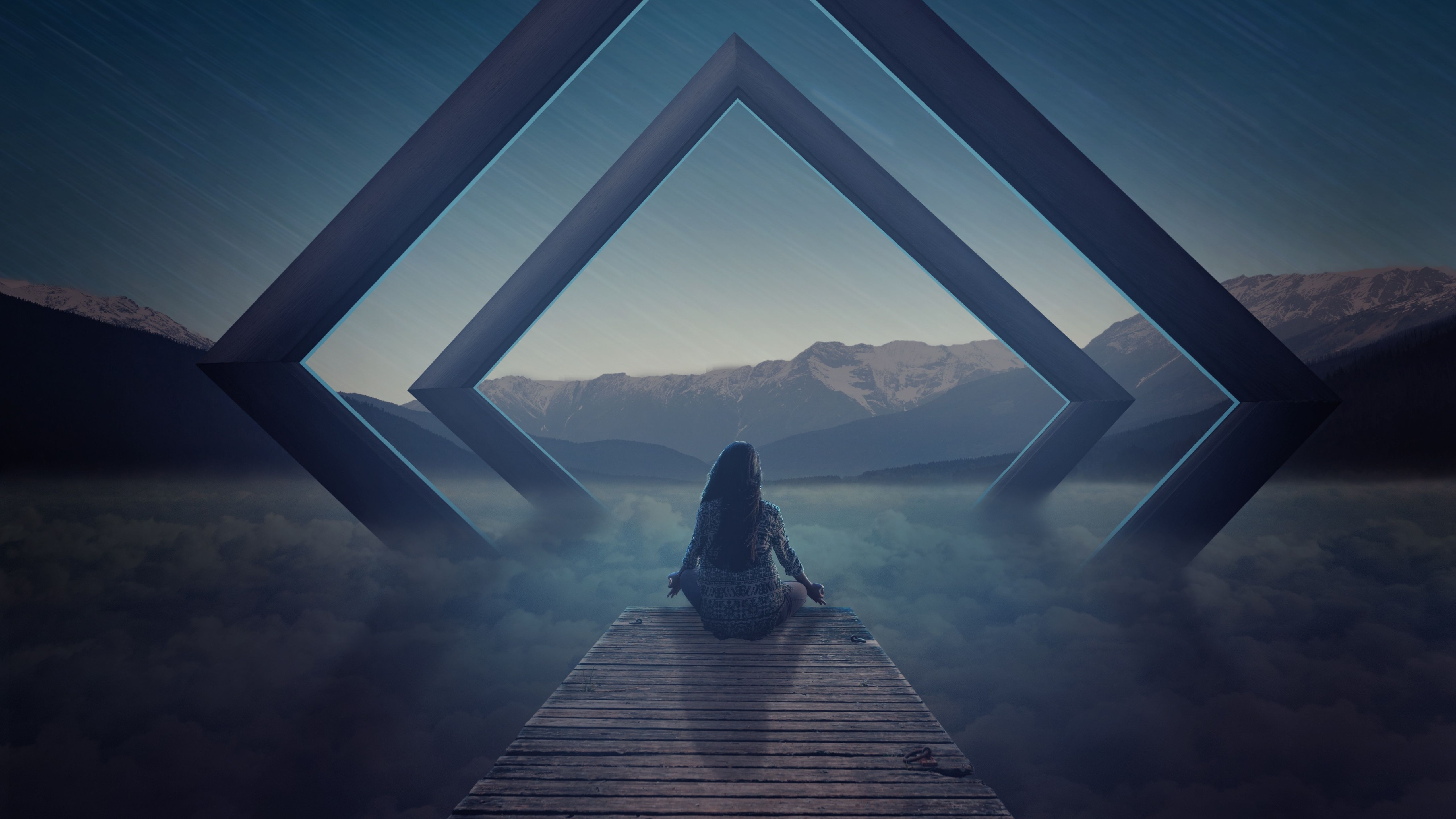 A woman sitting on the edge of some rocks - Spiritual