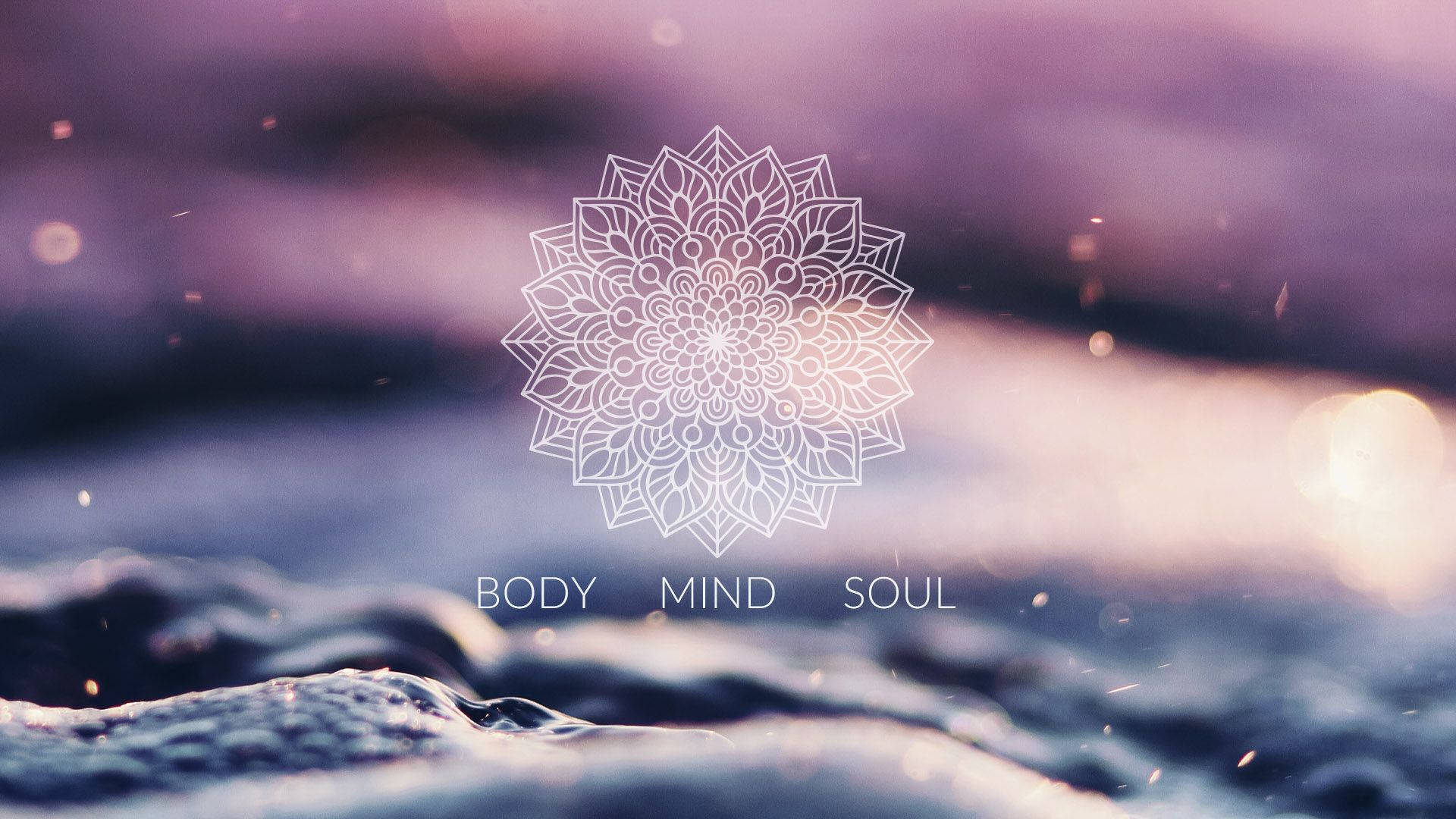 A purple and blue background with the words body mind soul - Spiritual