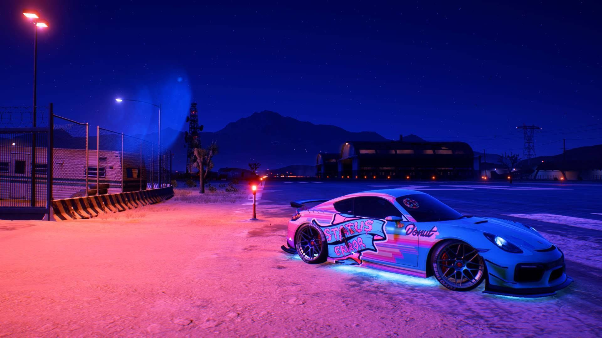 A screenshot of a Porsche 911 GT3 in the desert at night. - Cars