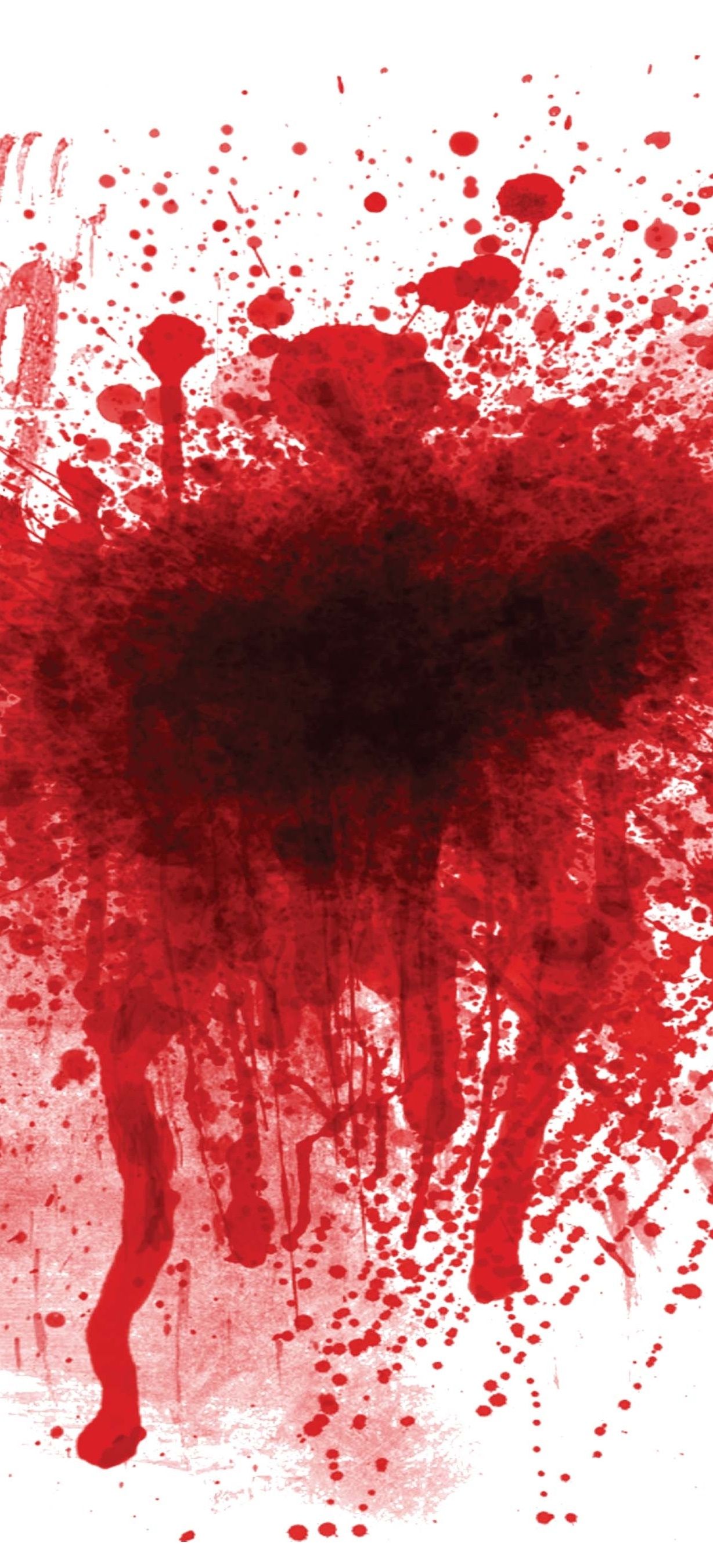 A red stain on the ground - Blood