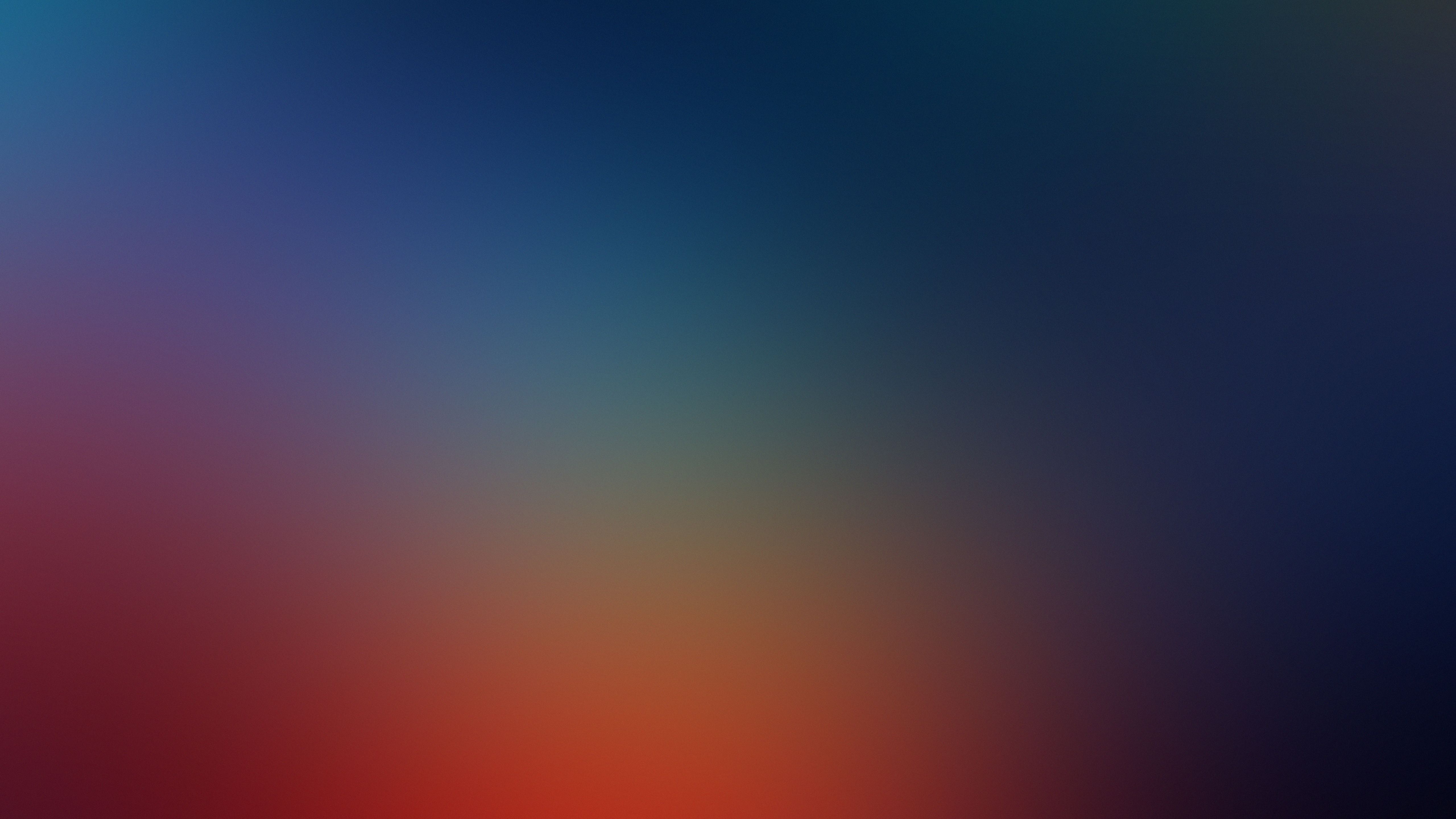 A red and blue gradient background - Blurry