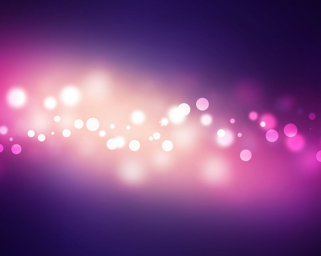 A pink and purple abstract background with bokeh lights - Glitter