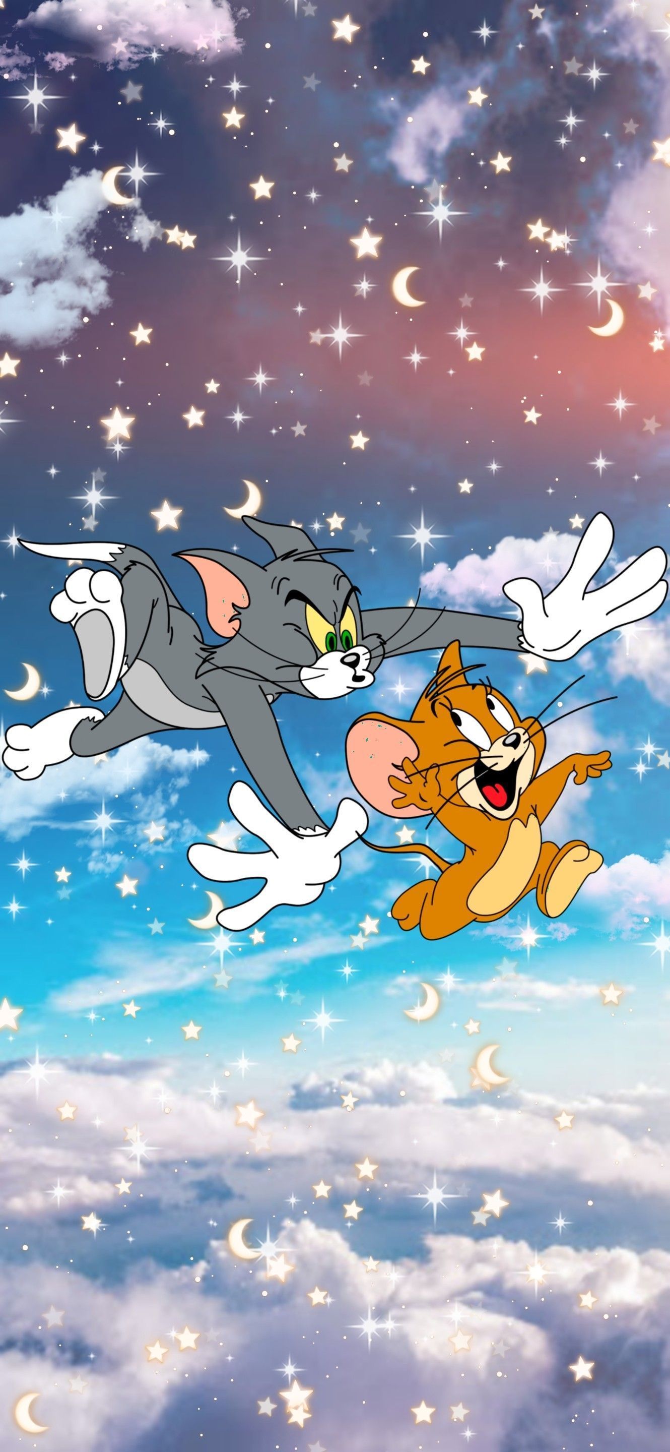 A cartoon cat and mouse flying in the sky - Tom and Jerry