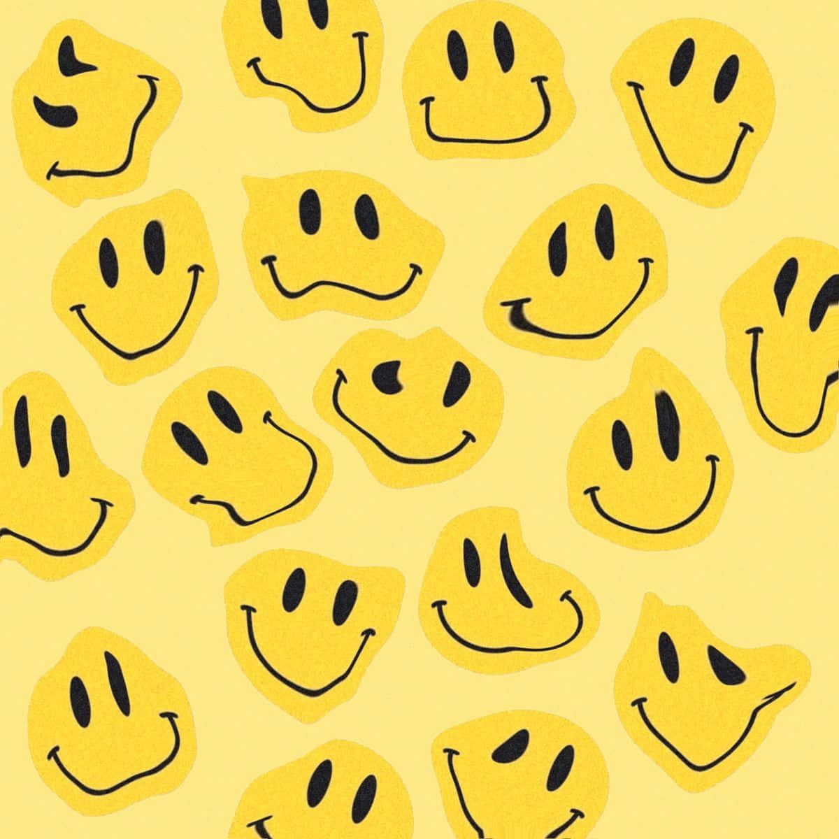 A pattern of yellow smiley faces on the wall - Smile