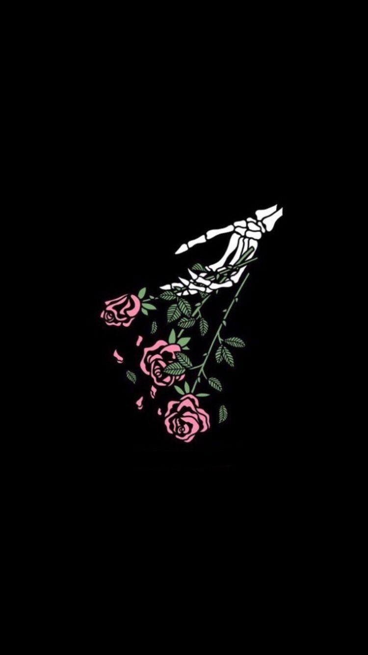 A skeleton holding roses on black background - Black rose