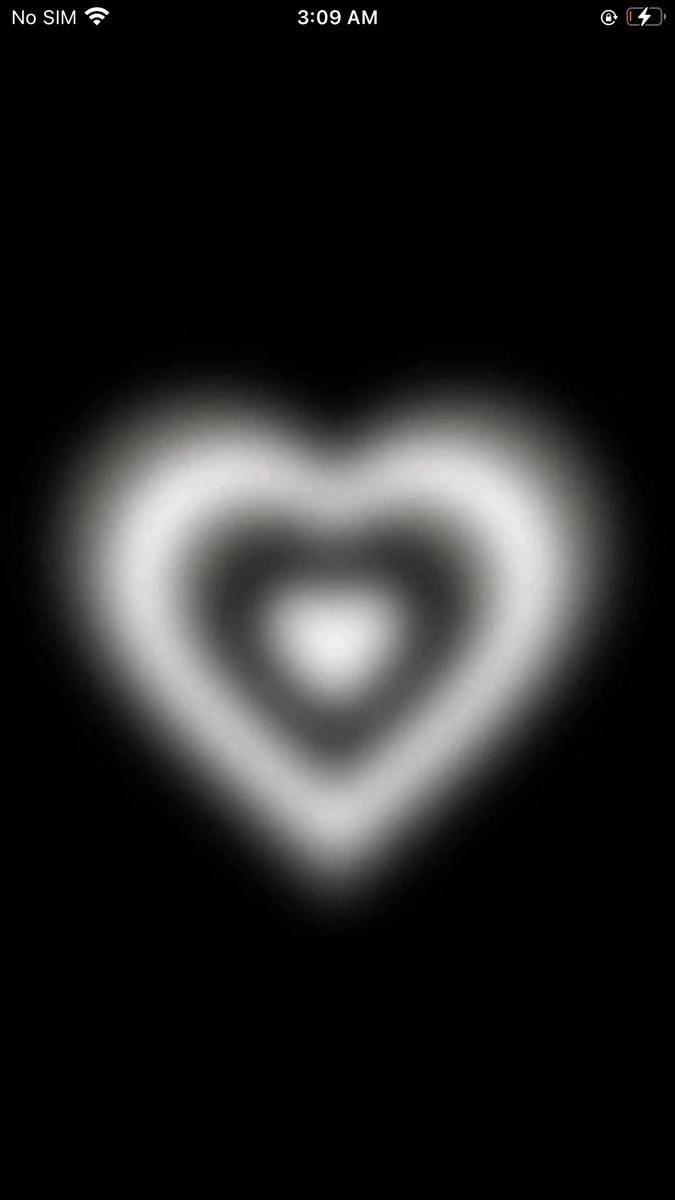 A heart shape made of white smoke on a black background - Black heart