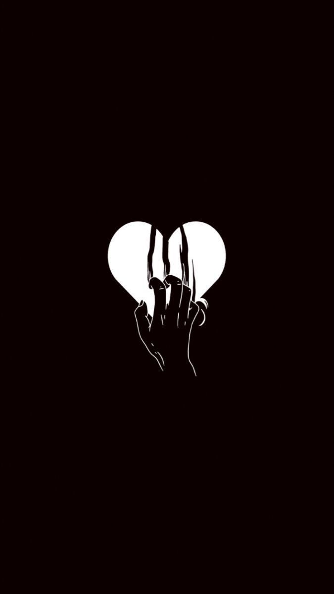 A black and white image of two hands holding each other - Black heart