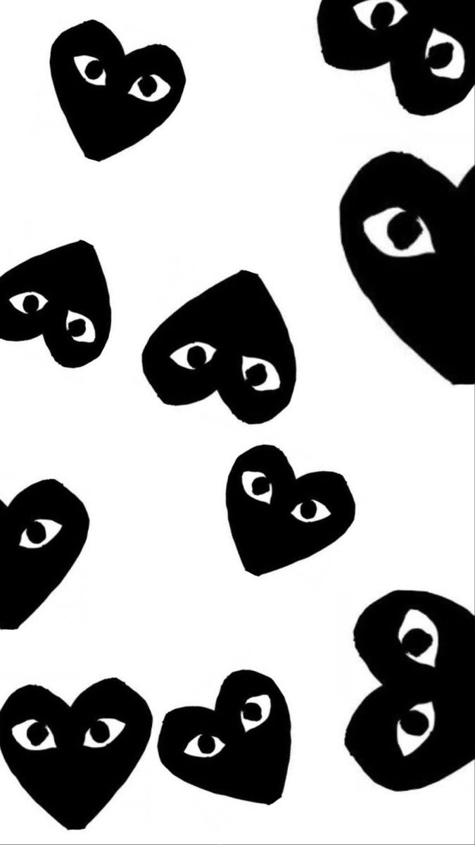 A pattern of black hearts with eyes on a white background - Black heart